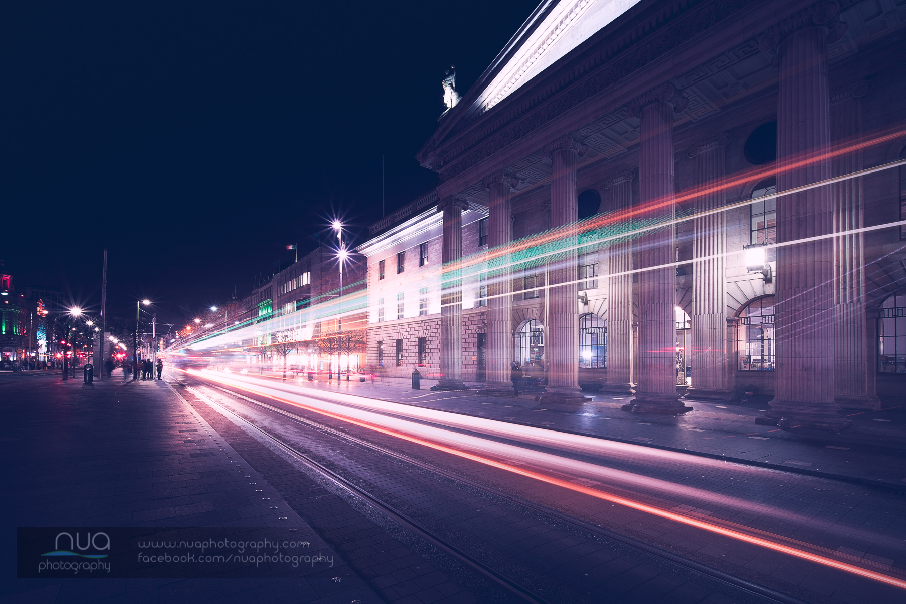 Lights of the Luas in motion on O'Connell Street Dublin Ireland